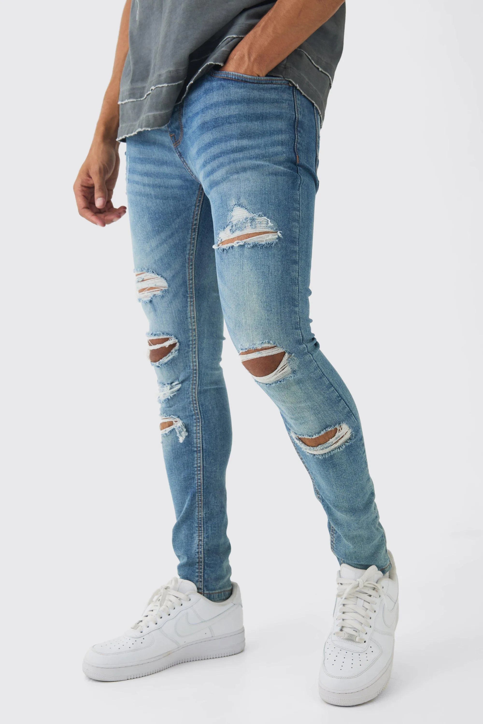 Skinny Fit All Over Ripped Jeans